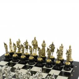 Шахматы "Русь" из мрамора и змеевика на каменных подставках 44х44 см